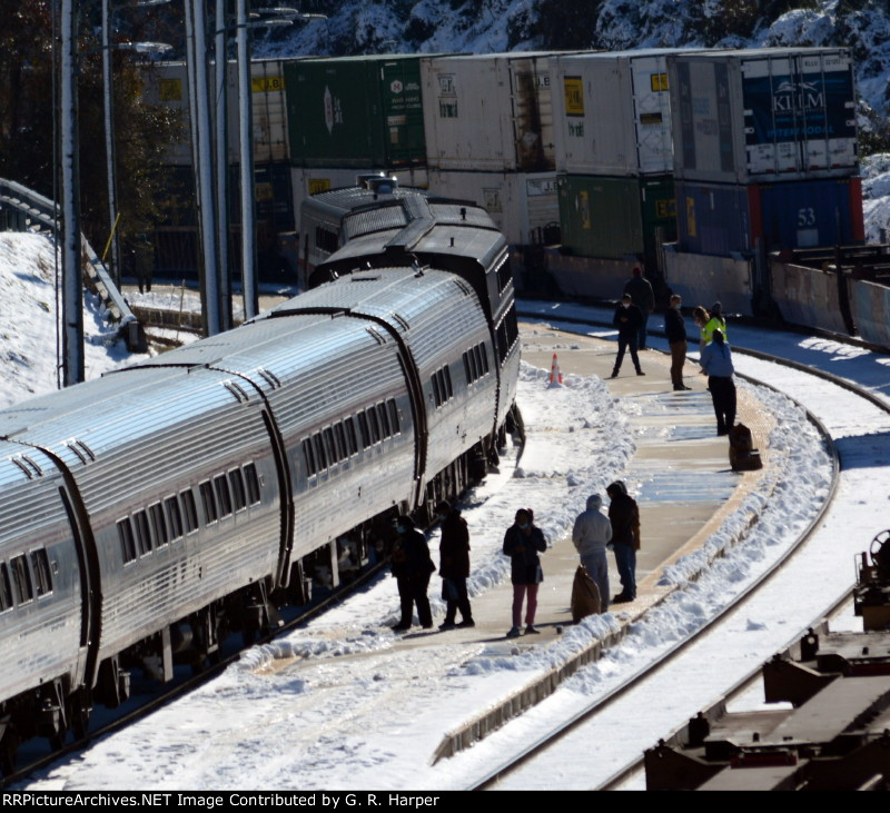 It's midday on January 4.  Amtrak #20(2) still sits at Lynchburg.  Passengers kill time on the platform awaiting departure time.